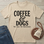 Sand-colored "Coffee & Dogs" graphic tee with jeans, a braided leash, and a "Dog Treats" bag.