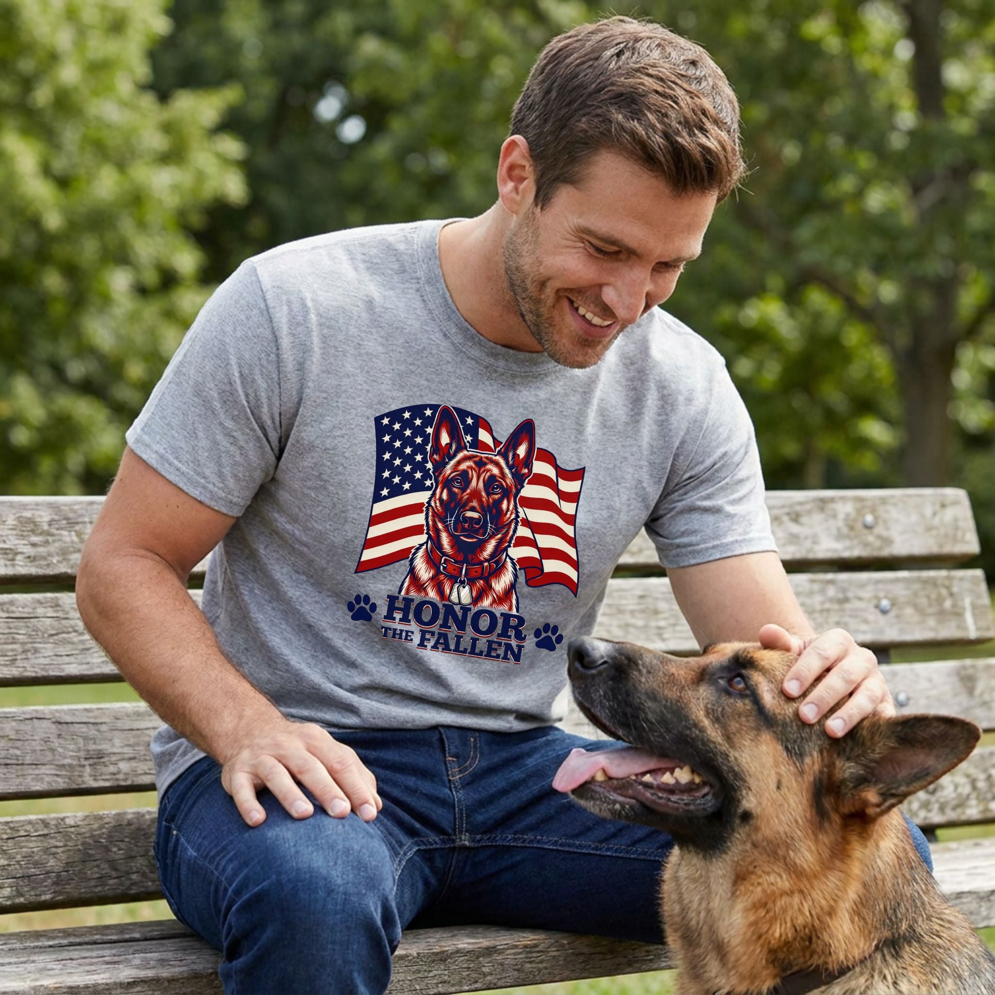 Man in a gray Gildan Softstyle® tee with an American flag, German Shepherd, and "Honor The Fallen" graphic, petting a dog.