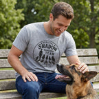 Gray cotton t-shirt with "Official Shadow Management Team" graphic, worn by a man petting a German Shepherd.