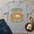 Light grey cotton t-shirt with "Professional Foster Fail" text and a dog on a couch design.