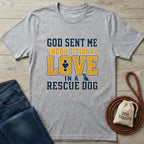 Light grey Gildan Softstyle t-shirt with "God Sent Me Unconditional Love In A Rescue Dog" text and dog graphic.