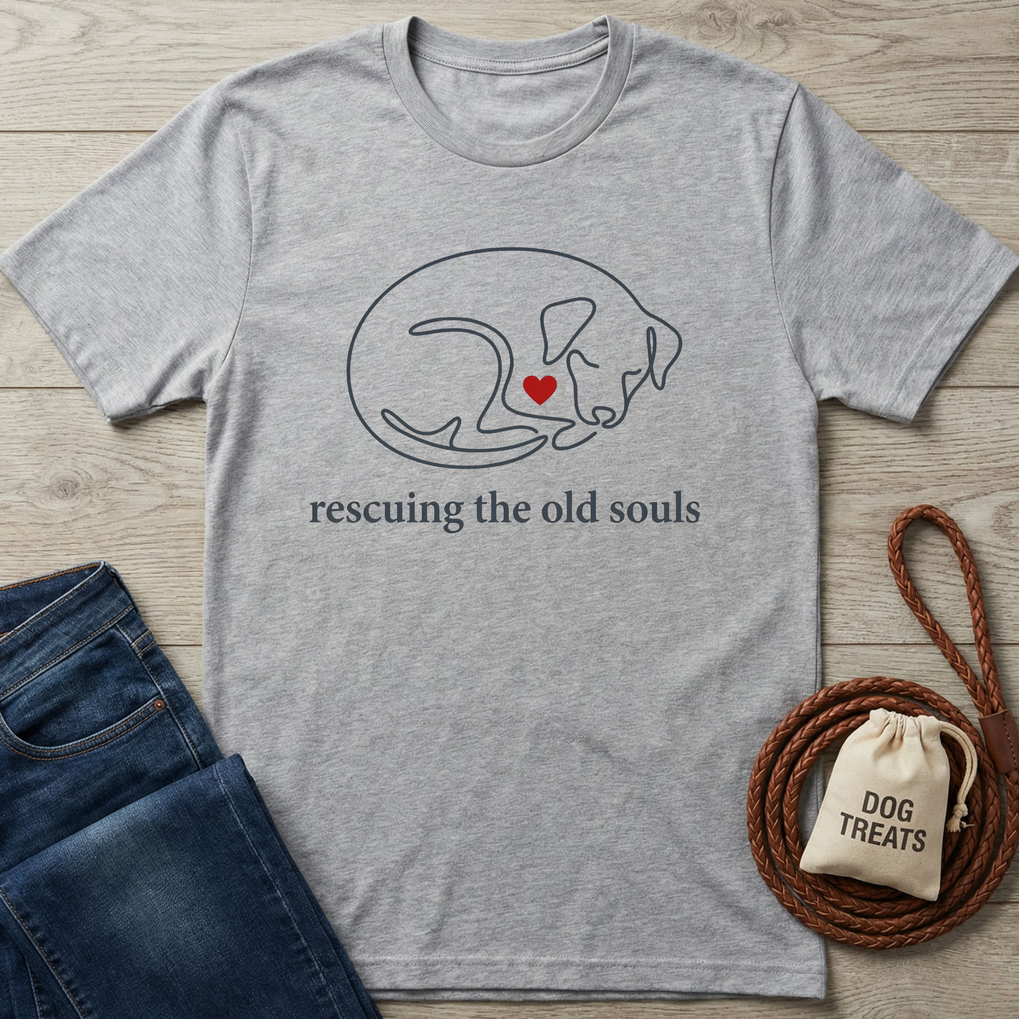 Heather grey cotton t-shirt with a minimalist dog outline and red heart, "rescuing the old souls" text.