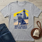 Light grey Gildan Softstyle® tee with a rescue dog and lighthouse graphic, "My Light In The Mist" text.