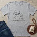 Light grey Gildan Softstyle t-shirt with a black line art graphic of a person reading with a rescue dog.