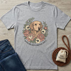 Heather grey Gildan Softstyle t-shirt with a golden retriever and floral "Kind Heart Brave Soul" graphic.