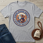 Gray Senior Rescue Society t-shirt with a vintage dog graphic, next to jeans and dog treats.