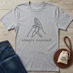 Heather grey cotton t-shirt with "simply rescued" text and a dog paw and human hand forming a heart graphic.