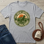 Heather grey Gildan Softstyle t-shirt with "The Great Outdoors Best Trail Buddy" dog and mountain graphic.