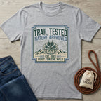 Light grey Gildan Softstyle t-shirt with "Trail Tested Nature Approved" graphic, jeans, and dog leash.