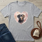 Light grey Gildan Softstyle t-shirt with a black lab in a pink watercolor heart, next to jeans and dog treats.