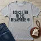 Light grey Gildan Softstyle® t-shirt with "I CONSULTED MY DOG THE ANSWER IS NO" text, next to jeans and dog treats.