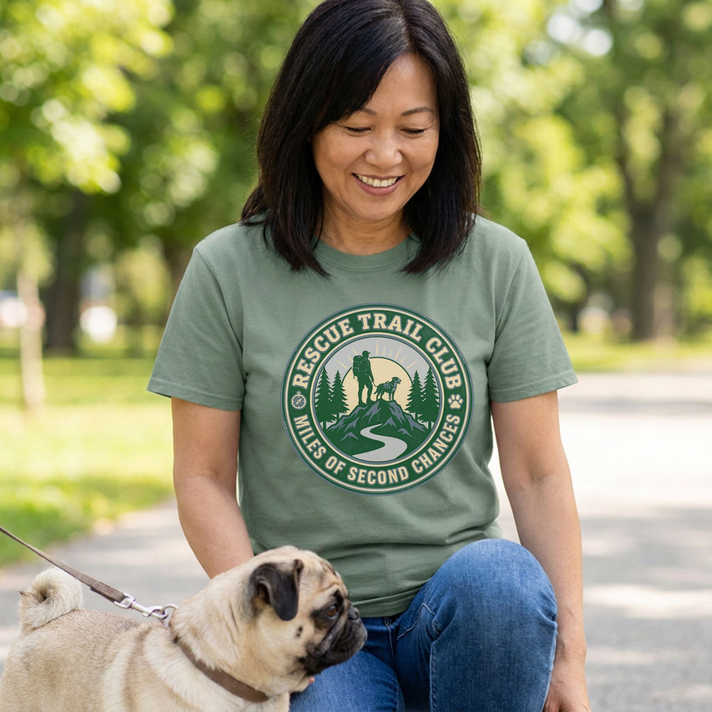 Woman in a green "Rescue Trail Club" graphic tee with a pug, promoting dog rescue.