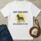 White Gildan Softstyle® t-shirt with "Sent From Above On A Mission To Love" text and a dog silhouette with a yellow sunburst.