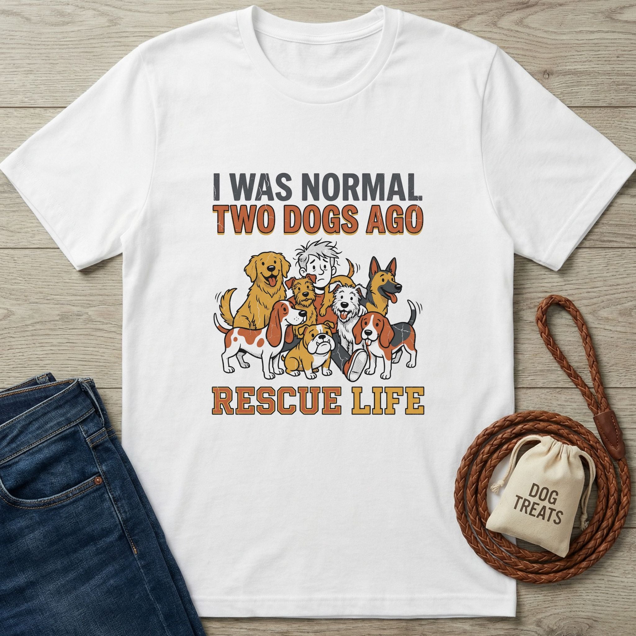 White Gildan Softstyle® t-shirt with "I Was Normal Two Dogs Ago Rescue Life" graphic and dog illustrations.
