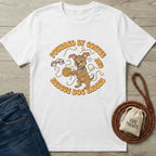 White Gildan Softstyle® t-shirt with "Powered by Coffee & Rescue Dog Kisses" graphic, jeans, and dog leash.