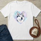 White Gildan Softstyle® t-shirt with a watercolor husky head in a pastel heart, next to jeans and a leash.