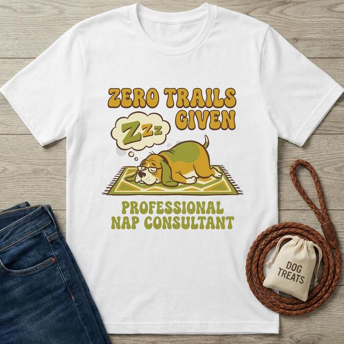 White cotton t-shirt with a sleeping beagle graphic and "Zero Trails Given, Professional Nap Consultant" text.