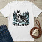 White Gildan Softstyle t-shirt with a black and white husky, snowy trees, and "WILD & MERRY" text.