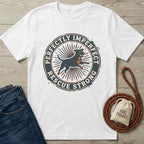 White cotton t-shirt with "Perfectly Imperfect Rescue Strong" text and a black dog graphic.