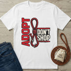 White Gildan Softstyle® t-shirt with "ADOPT DON'T SHOP" design featuring a red rope.