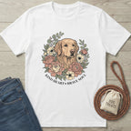 White Gildan Softstyle® t-shirt with a golden retriever and floral wreath design, "Kind Heart Brave Soul" text.
