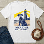 White Gildan Softstyle t-shirt with a graphic of a rescue dog, lighthouse, and "My Light In The Mist" text.