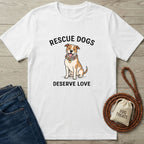 White Gildan Softstyle t-shirt with "RESCUE DOGS DESERVE LOVE" text and a smiling dog wearing a flower collar.